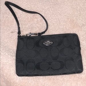 Almost new black coach wristlet